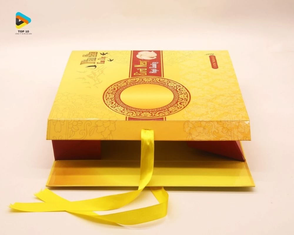 Mẫu hộp yến màu vàng dây ruy vàng