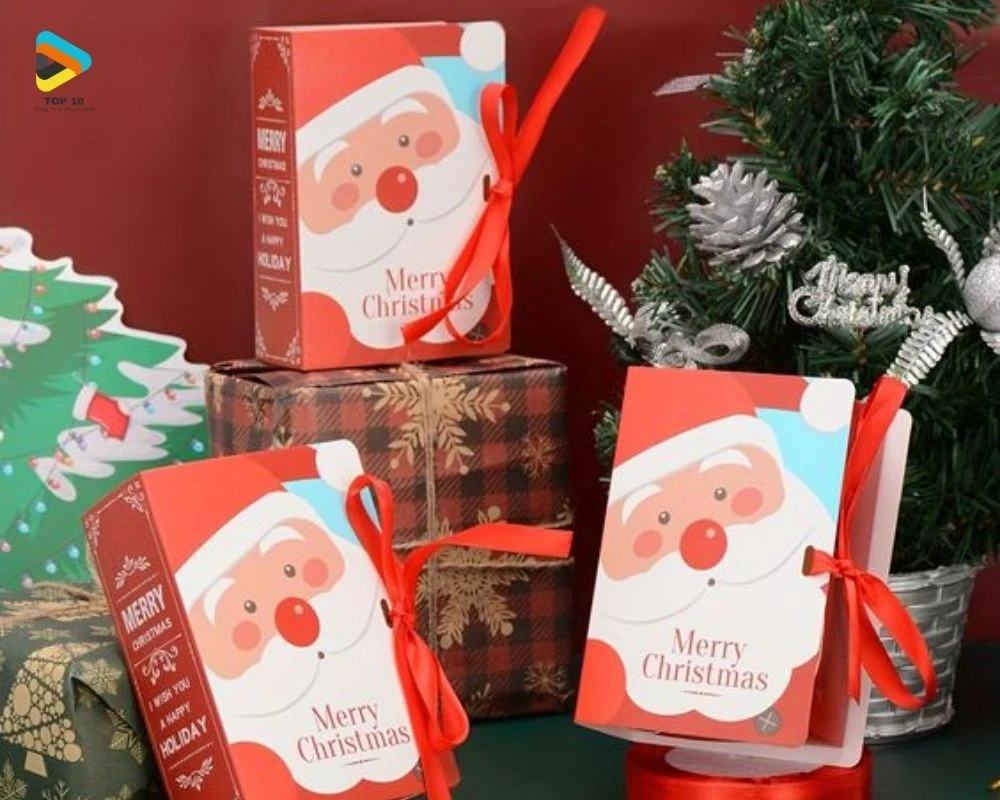 Hộp giáng sinh in mặt ông già Noel có gắn nơ
